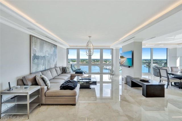 living room with a chandelier, expansive windows, marble finish floor, and crown molding