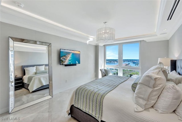 bedroom featuring a chandelier, a tray ceiling, visible vents, and baseboards