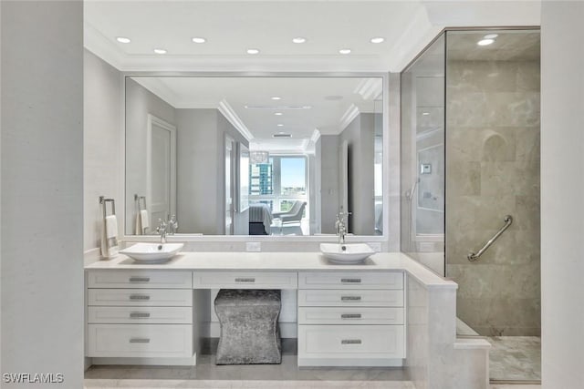 full bath with crown molding, double vanity, a sink, and a walk in shower