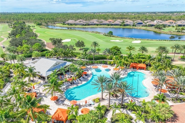 birds eye view of property featuring view of golf course and a water view