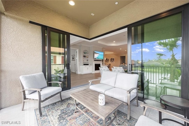 view of patio featuring a balcony