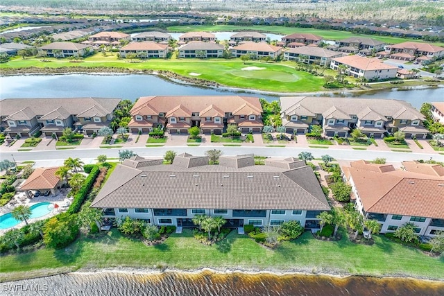 aerial view with a water view and a residential view