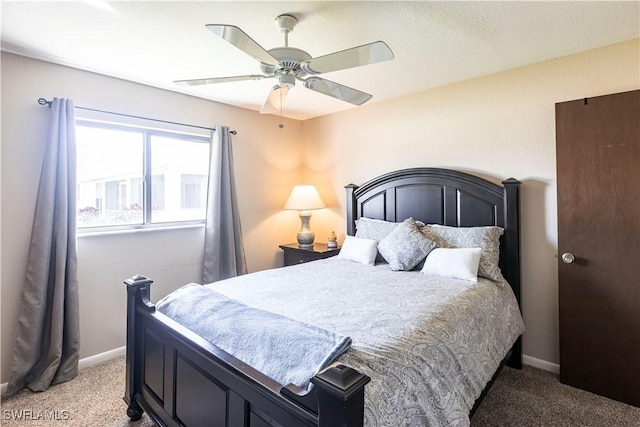 bedroom featuring carpet floors, baseboards, and a ceiling fan