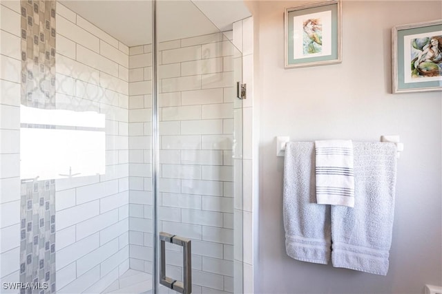 bathroom with a stall shower