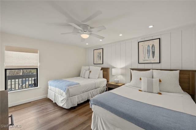 bedroom with ceiling fan, baseboards, wood finished floors, and recessed lighting