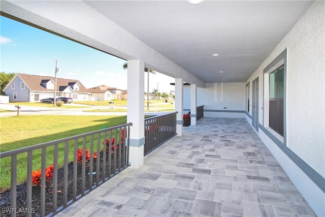 view of patio with a residential view