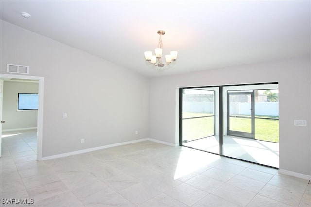 spare room with a chandelier, light tile patterned floors, visible vents, baseboards, and vaulted ceiling