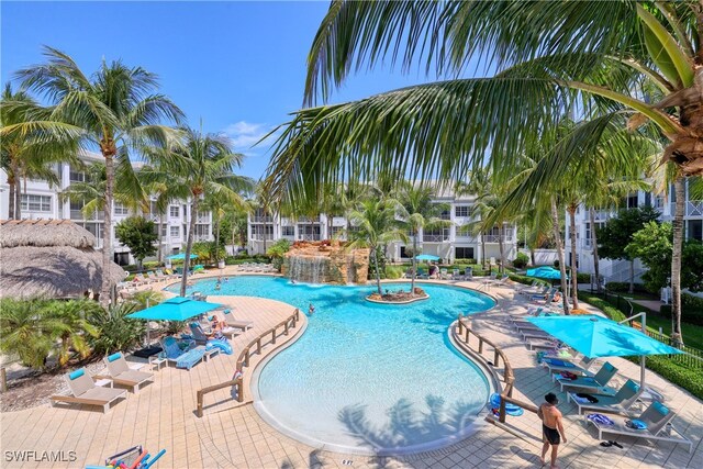 community pool with a patio