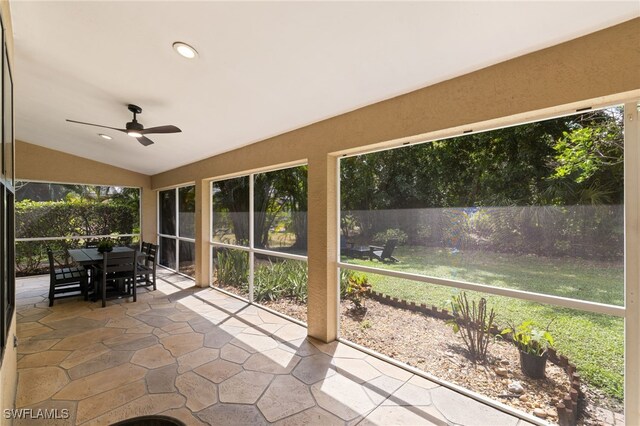 7735 Citrus Hill Ln, Naples, FL 34109 - sunroom featuring ceiling fan, outdoor dining space, and vaulted ceiling