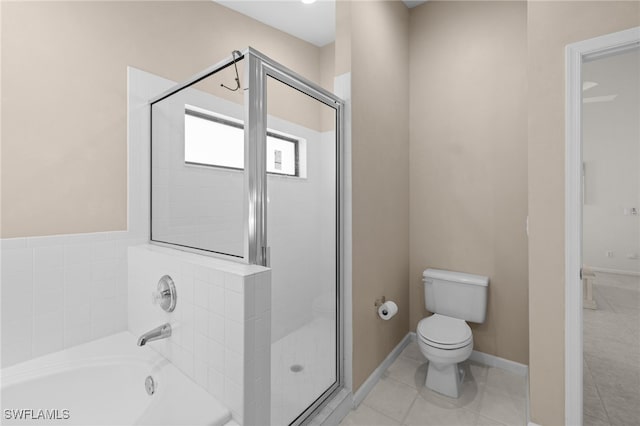 7735 Citrus Hill Ln, Naples, FL 34109 - bathroom featuring toilet, a stall shower, a bath, and tile patterned floors
