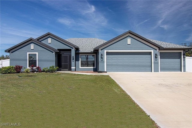 ranch-style home with a garage, concrete driveway, a front lawn, and stucco siding