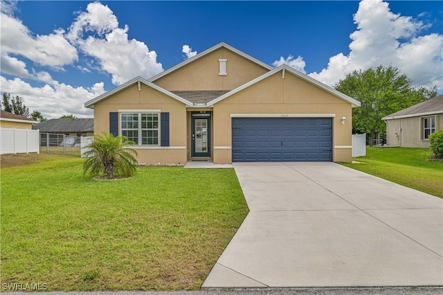 ranch-style home featuring a garage, fence, driveway, stucco siding, and a front lawn