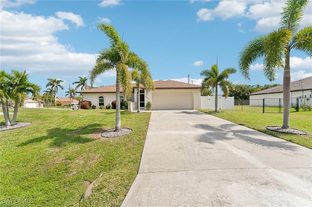 ranch-style home featuring stucco siding, concrete driveway, a front yard, fence, and a garage