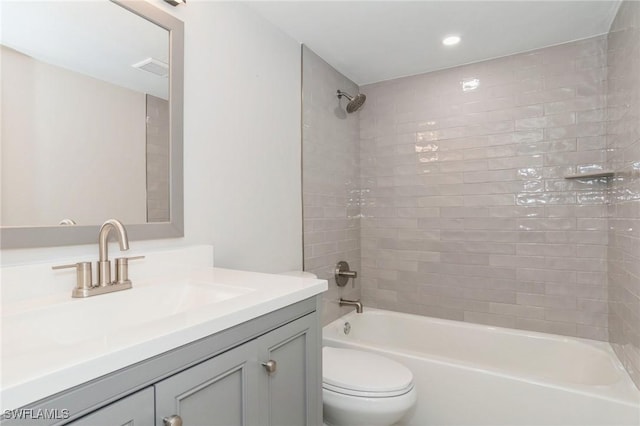 full bath with toilet, washtub / shower combination, and vanity