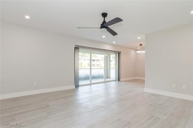 unfurnished room featuring light wood-type flooring, baseboards, a ceiling fan, and recessed lighting