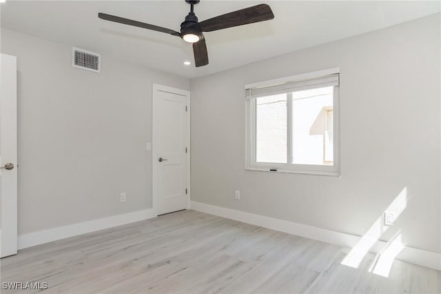 unfurnished bedroom with baseboards, visible vents, ceiling fan, light wood-style floors, and recessed lighting