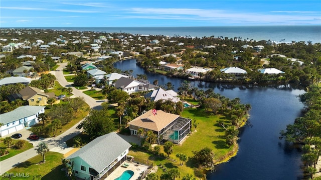 aerial view featuring a water view and a residential view