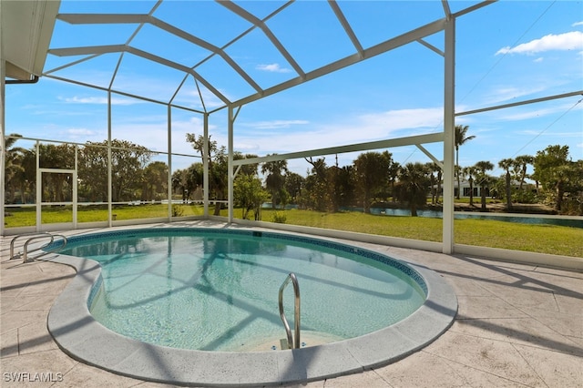 outdoor pool featuring a lanai, a patio area, and a lawn