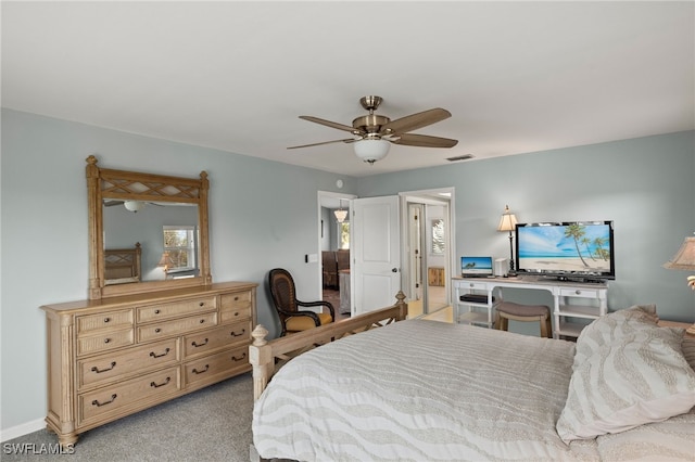 bedroom with light carpet, visible vents, and a ceiling fan