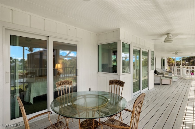 wooden deck with ceiling fan