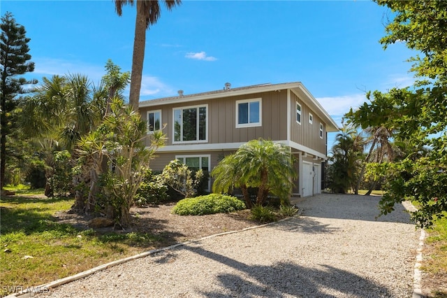 view of front facade with driveway and an attached garage