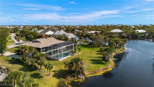 birds eye view of property featuring a water view and a residential view