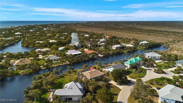 bird's eye view featuring a residential view and a water view