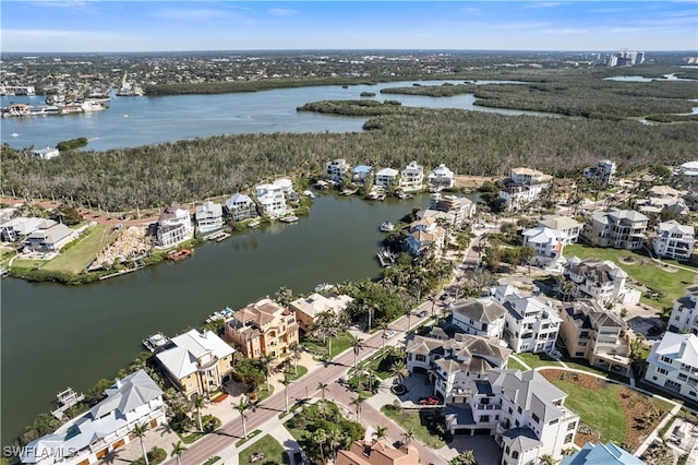 aerial view with a water view and a residential view