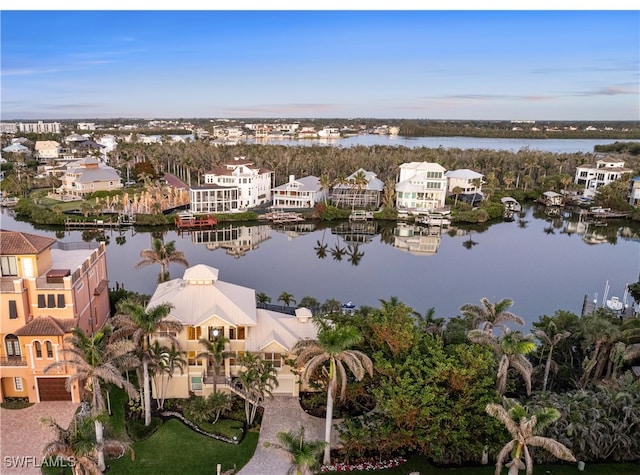 aerial view featuring a residential view and a water view