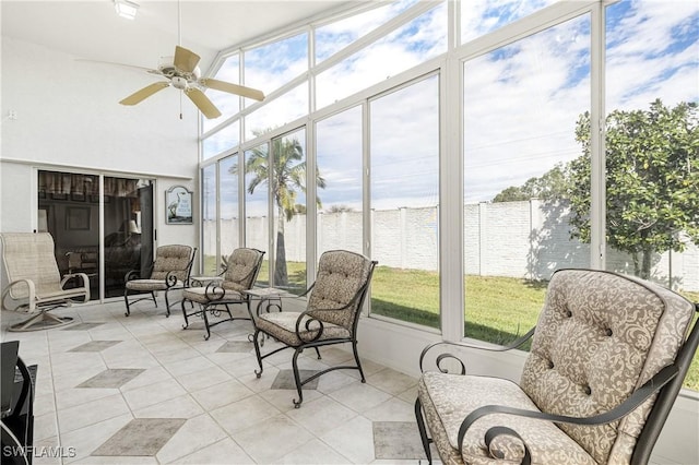 sunroom / solarium with ceiling fan and a wealth of natural light