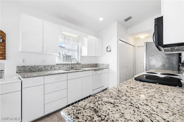 kitchen featuring light stone counters, a sink, visible vents, white cabinetry, and dishwasher