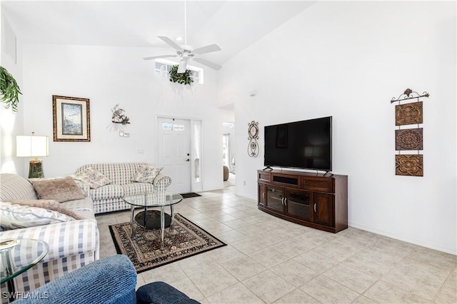 living room with light tile patterned floors, ceiling fan, and high vaulted ceiling