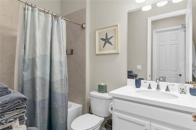 full bathroom featuring vanity, toilet, and shower / bath combo with shower curtain