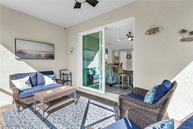 view of patio / terrace featuring an outdoor hangout area and a ceiling fan