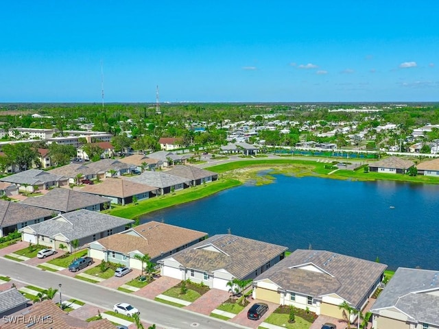 birds eye view of property featuring a residential view and a water view