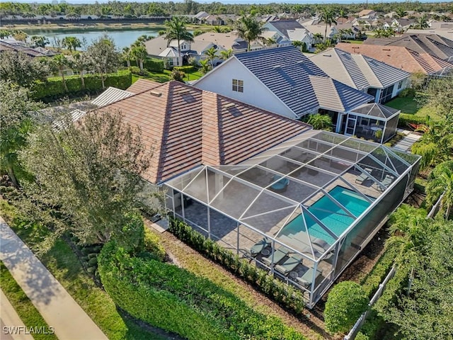aerial view with a water view and a residential view