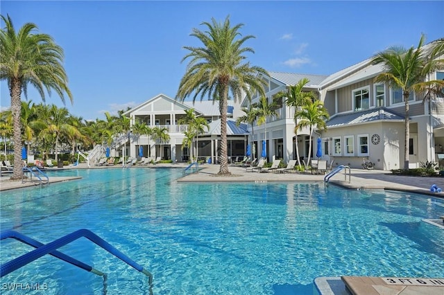 community pool featuring a patio area
