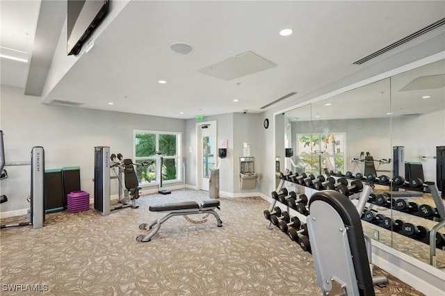 gym featuring baseboards, carpet floors, visible vents, and recessed lighting