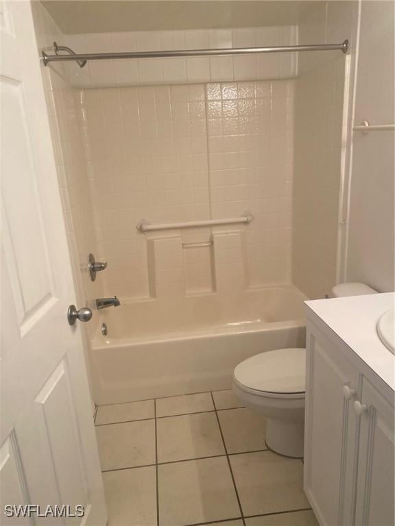 14801 Park Lake Dr Unit 203, Fort Myers, FL 33919 - bathroom with toilet, tile patterned flooring, vanity, and shower / bathtub combination