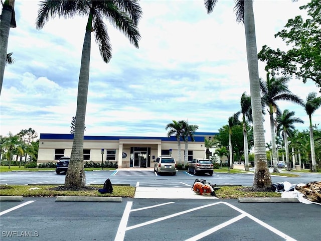 14801 Park Lake Dr Unit 203, Fort Myers, FL 33919 - view of property featuring uncovered parking