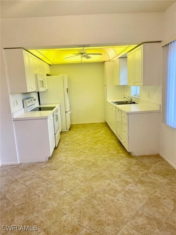 14801 Park Lake Dr Unit 203, Fort Myers, FL 33919 - kitchen with a ceiling fan, white appliances, light countertops, and a sink