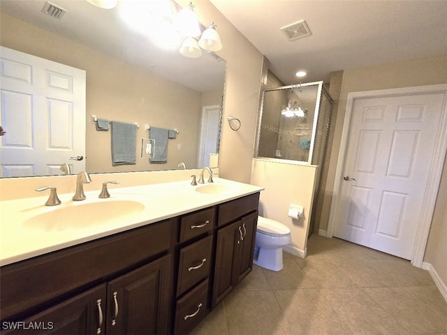 full bathroom with double vanity, visible vents, and a sink