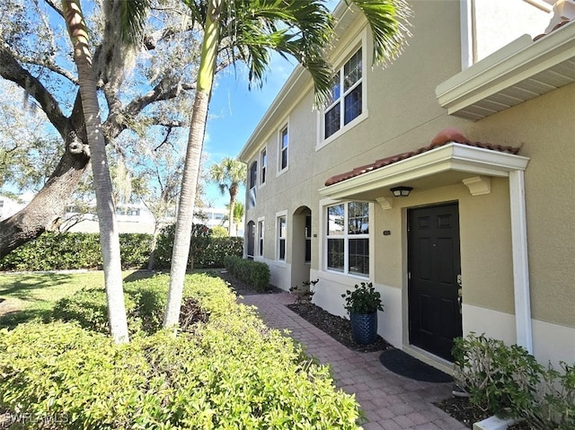 view of home's exterior with stucco siding