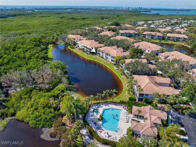 aerial view featuring a water view and a residential view