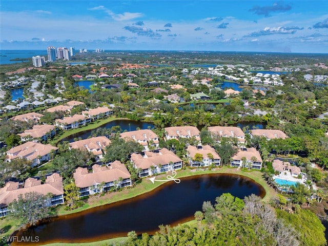 drone / aerial view featuring a water view