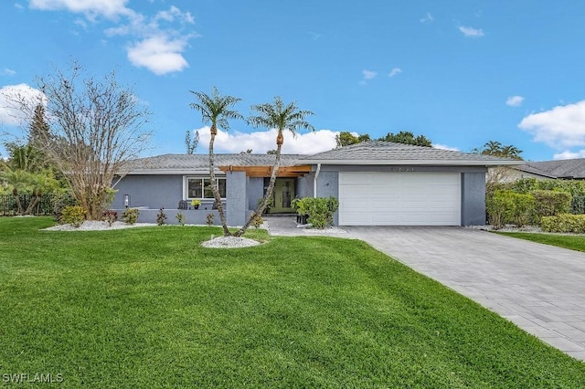 ranch-style house with an attached garage, a front lawn, decorative driveway, and stucco siding