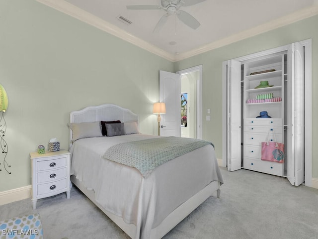 7627 Palmer Ct, Naples, FL 34113 - bedroom with light colored carpet, baseboards, ornamental molding, and visible vents