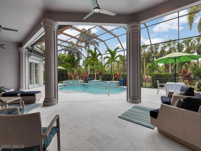 7627 Palmer Ct, Naples, FL 34113 - view of pool with a patio area, a ceiling fan, a pool with connected hot tub, and glass enclosure