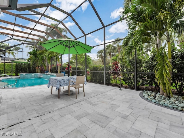 7627 Palmer Ct, Naples, FL 34113 - view of patio / terrace with a pool with connected hot tub and a lanai