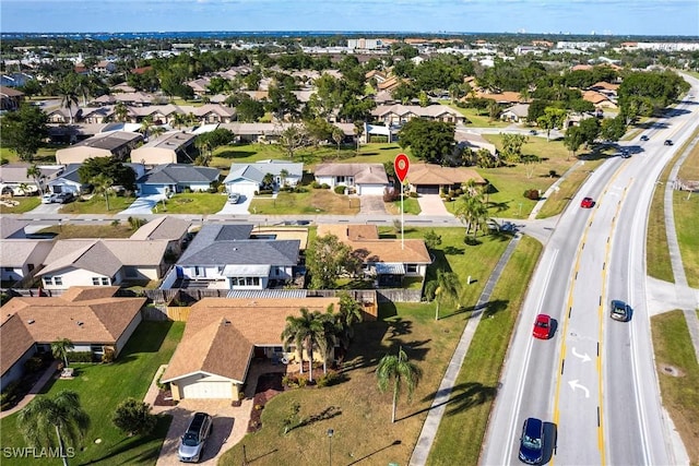 drone / aerial view with a residential view